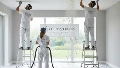 Technician removing popcorn ceiling in Reno NV home for smooth modern interior finish